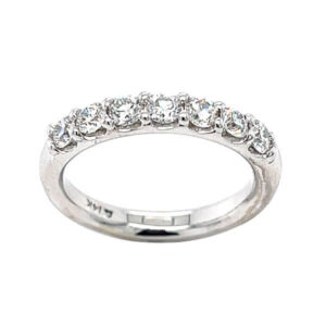 Anniversary or wedding band set with shared prong brilliant cut diamond melee 