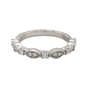 Vintage inspired band with diamonds and a millgrain finish