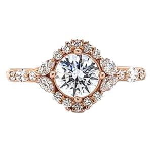 Halo engagement ring set with marquise cut and brilliant cut side diamond melee 