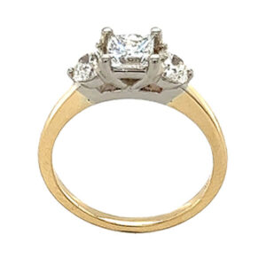 14kt two tone yellow and white gold ring set with half-moon melee and a princess cut center 