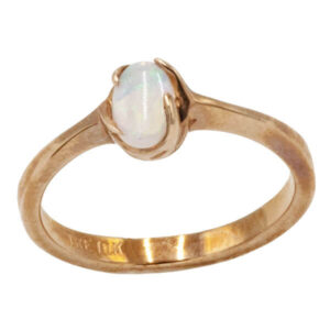 Oval cut opal in a freeform rose gold setting
