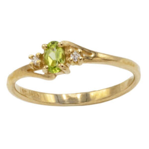 Oval cut green peridot ring with diamonds in a yellow gold setting