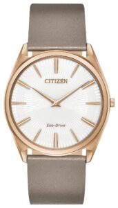 Gold tone stainless steel with white dial.
