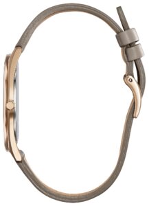Gold tone stainless steel with white dial.