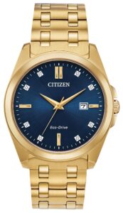 Gold tone stainless steel with blue dial and diamond accents