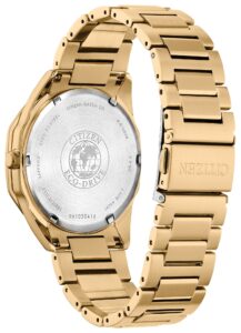 Gold tone stainless steel with silver tone dial