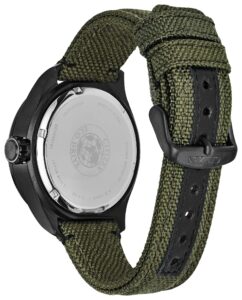 Black stainless steel with black dial and luminous hands and markers with a nylon strap and buckle closer.
